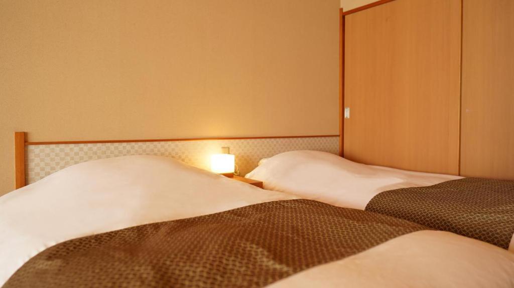 Tsukino Sumika Atami Juraku Hotel Exterior foto