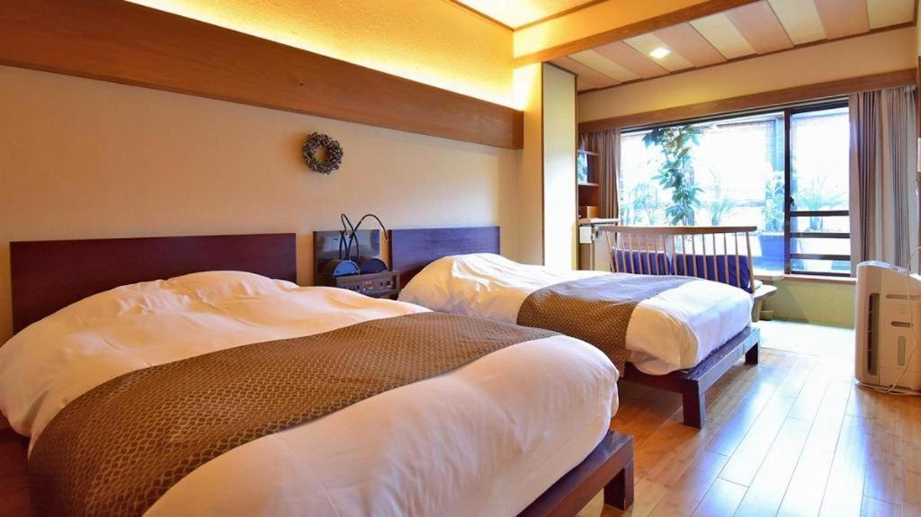 Tsukino Sumika Atami Juraku Hotel Exterior foto